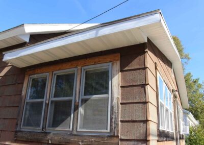 Gutters installed above windows