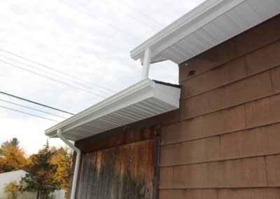 Gutters installed on side of house