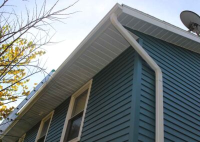 New gutters on blue house